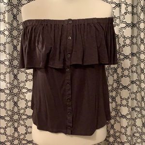 Woman’s off the shoulder shirt